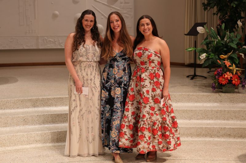 Emerging Artists Winners Emerging Artists WinnersFirst Place winner, Sarah Juliano in the dress with red roses on it. Second Place winner Rachael Dec is in the blue flowered dress. Third Place winner Syndey Roslin is in the beige sparkly flowered dress.